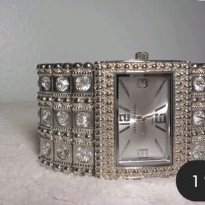 Beautiful Sophia Vergara watch with bling. Has stretchy band.
